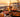 Tapas, Paella und Bier auf einer Strandterrasse an der Playa de Palma bei Sonnenuntergang – Restaurants Playa de Palma 2026